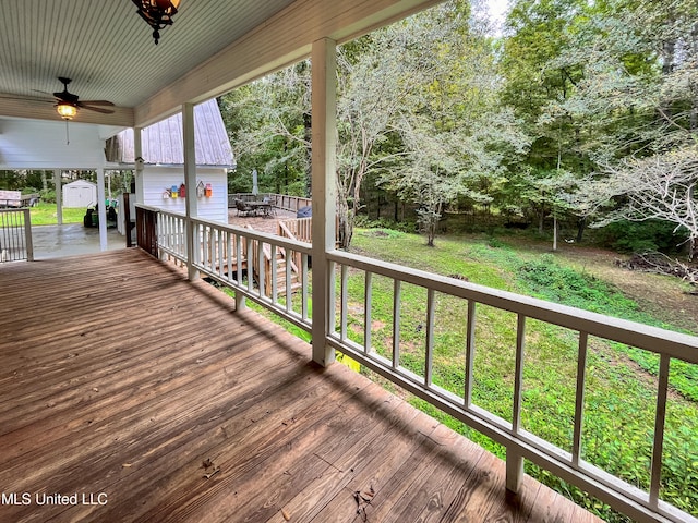 wooden deck with ceiling fan