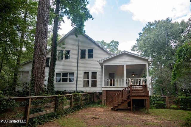 110 Quail Hollow Pl, Brandon, MS 39047 - back of property with stairway and ceiling fan