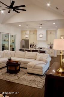 691 Apona St, Diamondhead, MS 39525 - living area featuring wood finished floors, ceiling fan, high vaulted ceiling, and recessed lighting