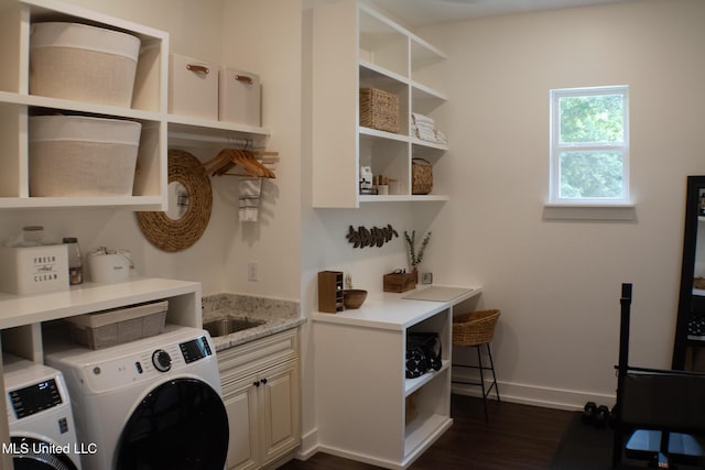 691 Apona St, Diamondhead, MS 39525 - laundry room featuring cabinet space, washer and clothes dryer, baseboards, and dark wood-style flooring