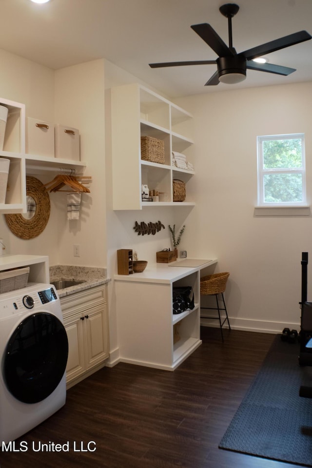 691 Apona St, Diamondhead, MS 39525 - washroom featuring washer / dryer, ceiling fan, cabinet space, dark wood-style floors, and baseboards