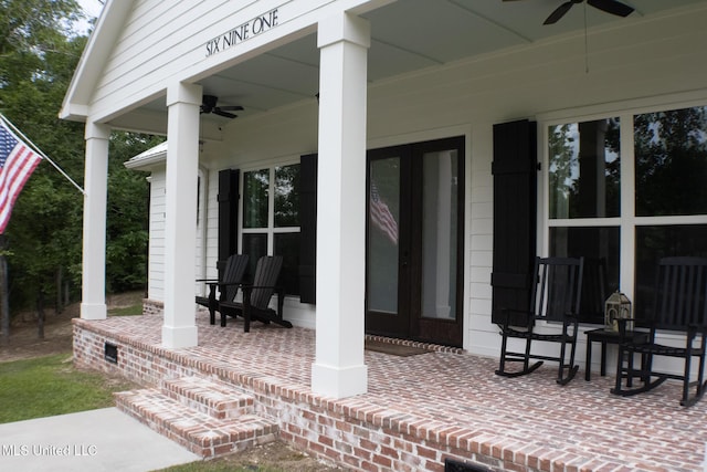 691 Apona St, Diamondhead, MS 39525 - porch featuring ceiling fan and french doors