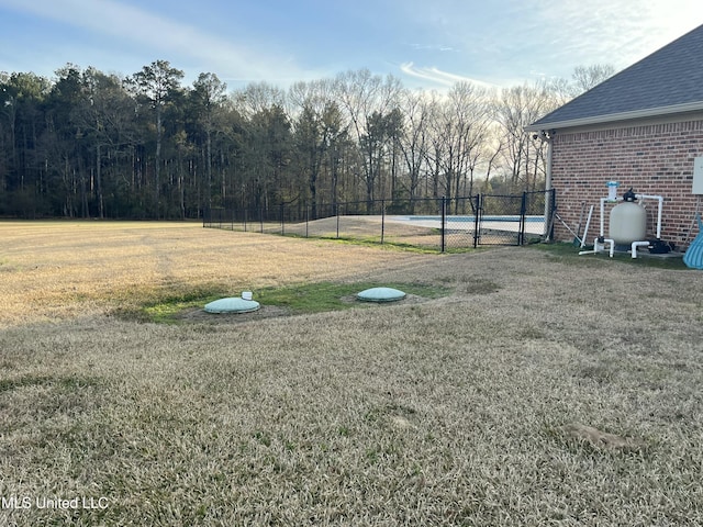 view of yard featuring a gate and fence