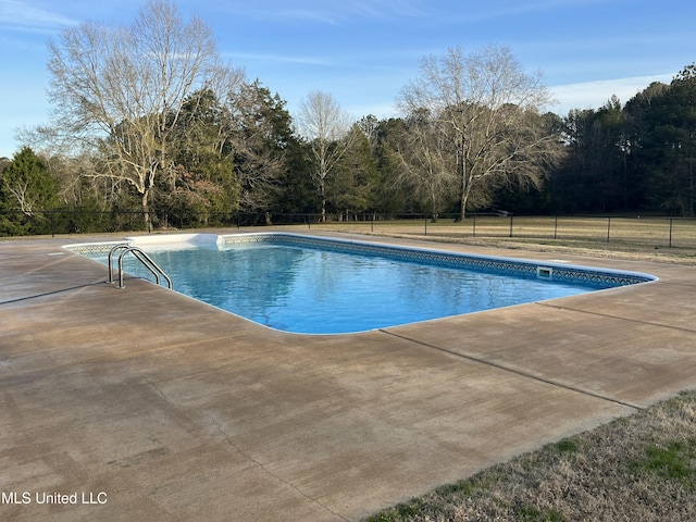 view of pool with fence, a fenced in pool, and a patio