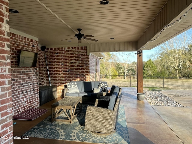 view of patio / terrace with ceiling fan, outdoor lounge area, and fence