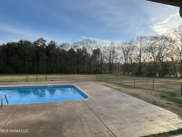 view of pool featuring a fenced in pool, fence private yard, and a patio