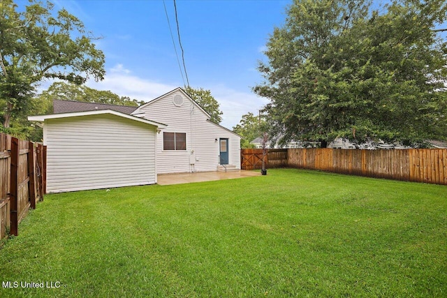 322 NW 2nd Ave, Magee, MS 39111 - rear view of house featuring a fenced backyard and a patio