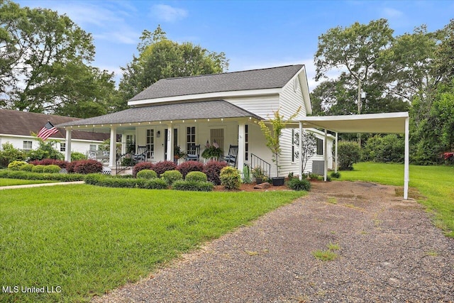 322 NW 2nd Ave, Magee, MS 39111 - country-style home featuring driveway, covered porch, a carport, a front lawn, and a shingled roof