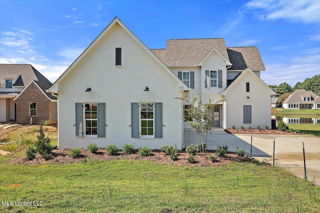 view of front of home with a front yard