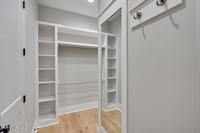 walk in closet featuring light wood-type flooring