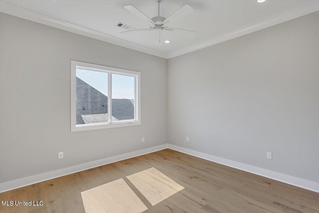 unfurnished room featuring light hardwood / wood-style floors and ceiling fan