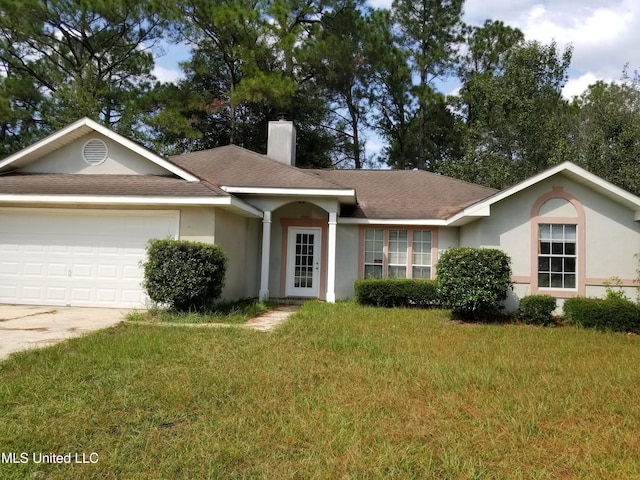 ranch-style home with a front lawn, a chimney, an attached garage, and stucco siding