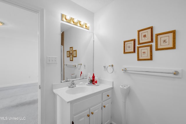 2390 Carter Rd, Biloxi, MS 39531 - bathroom featuring vanity and baseboards