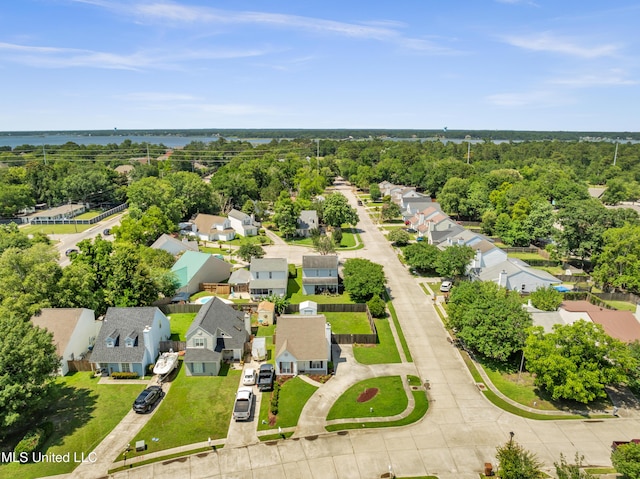 2390 Carter Rd, Biloxi, MS 39531 - aerial view of residential area featuring a nearby body of water and a tree filled landscape