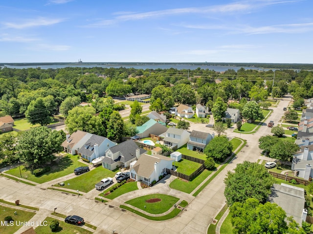 2390 Carter Rd, Biloxi, MS 39531 - aerial view of residential area with a nearby body of water and a tree filled landscape