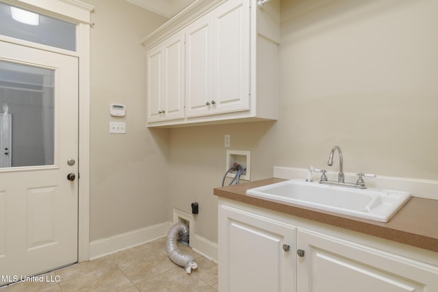 54 Saint Annes Dr, Hattiesburg, MS 39401 - washroom featuring cabinet space, washer hookup, light tile patterned flooring, and electric dryer hookup