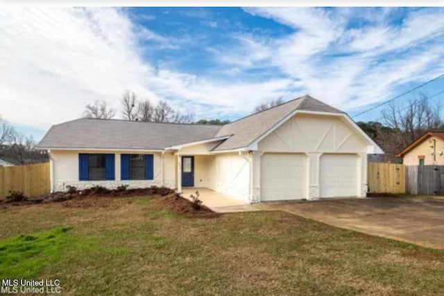 333 Gary Daniels Dr, Byram, MS 39272 - single story home featuring a garage, driveway, and stucco siding