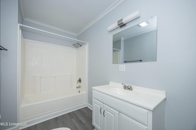 bathroom featuring vanity, shower / bathtub combination, crown molding, and wood-type flooring