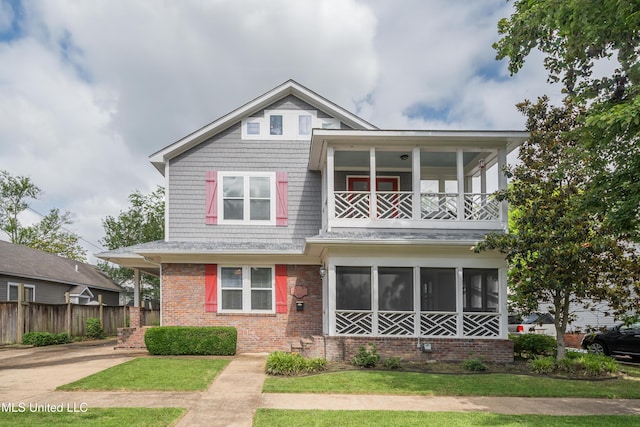 905 Franklin St, Corinth, MS 38834 - view of front facade featuring a balcony and brick siding