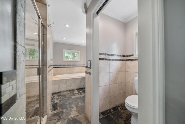 905 Franklin St, Corinth, MS 38834 - full bathroom with toilet, ornamental molding, a bath, tile walls, and a stall shower