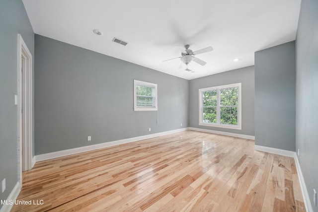 905 Franklin St, Corinth, MS 38834 - unfurnished room featuring light wood-style flooring, a ceiling fan, and baseboards