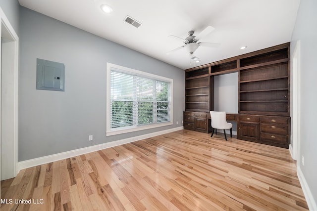 905 Franklin St, Corinth, MS 38834 - unfurnished office featuring electric panel, light wood-style floors, baseboards, a ceiling fan, and recessed lighting