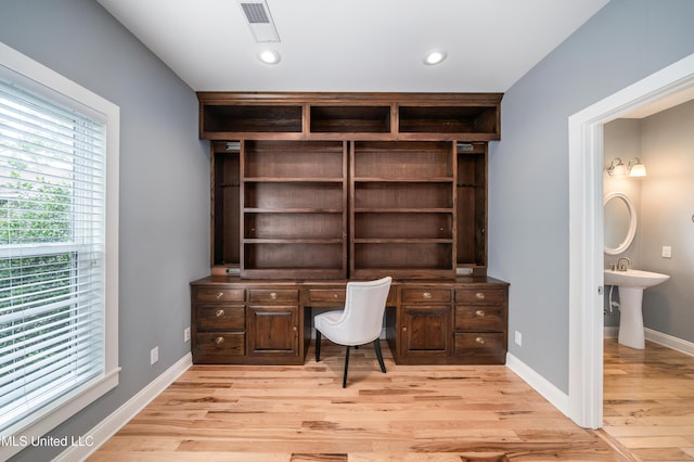 905 Franklin St, Corinth, MS 38834 - unfurnished office featuring light wood-style flooring, recessed lighting, and baseboards