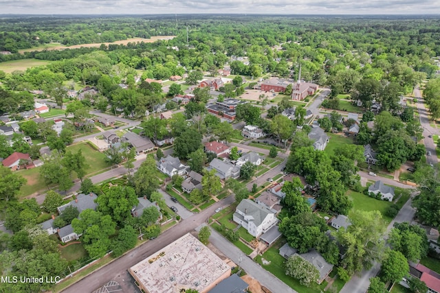 905 Franklin St, Corinth, MS 38834 - aerial view of residential area featuring a heavily wooded area