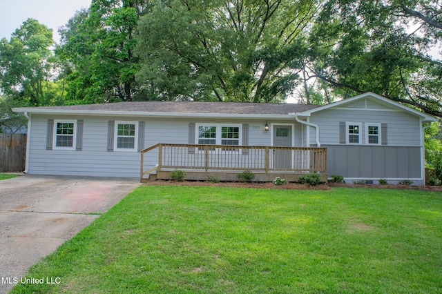 305 Lodi Dr, Pearl, MS 39208 - ranch-style home with concrete driveway and a front lawn