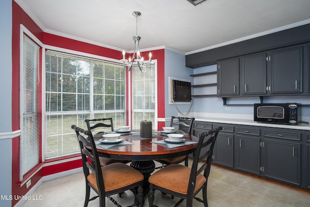 dining room featuring a chandelier, a toaster, a wall mounted air conditioner, and ornamental molding