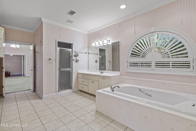 bathroom with vanity, independent shower and bath, and tile patterned flooring