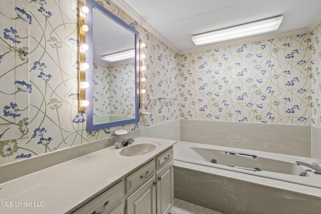 bathroom featuring vanity, crown molding, and a bathing tub