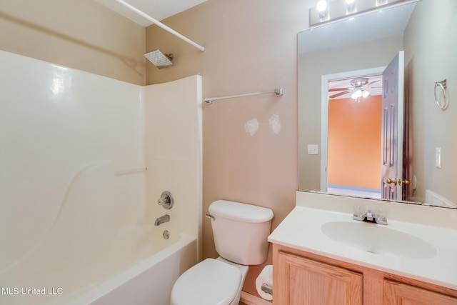 full bathroom featuring shower / tub combination, vanity, toilet, and ceiling fan