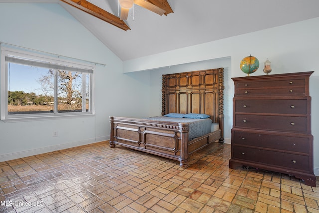 bedroom featuring ceiling fan and vaulted ceiling