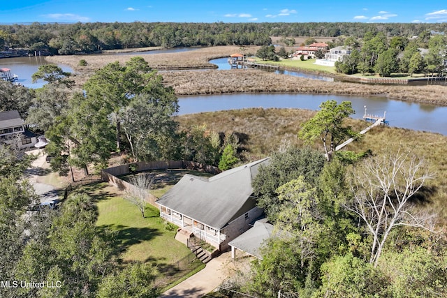 drone / aerial view with a water view