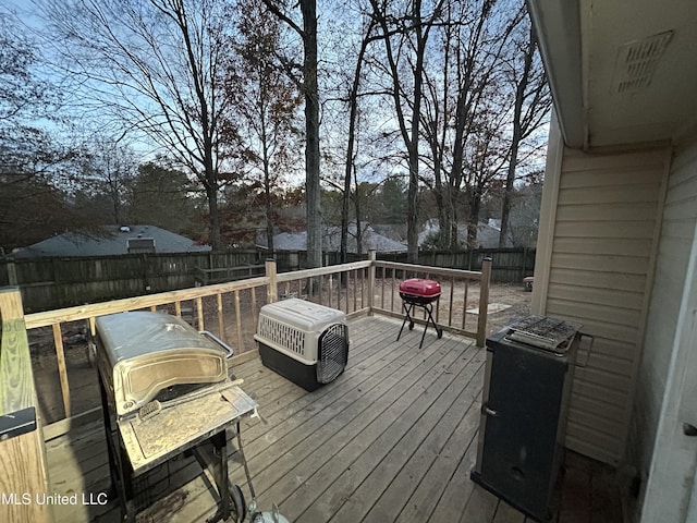 deck featuring a grill