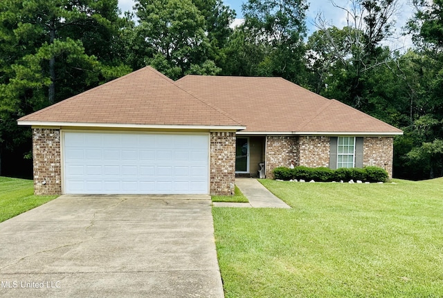 235 Gaddy Dr, Byram, MS 39272 - view of front of property featuring driveway, brick siding, and a front lawn