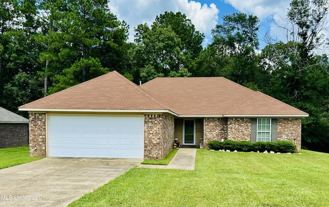 235 Gaddy Dr, Byram, MS 39272 - view of front of house featuring driveway, brick siding, a garage, and a front yard