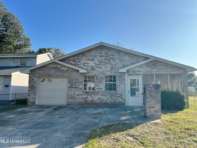 view of front of property featuring a garage