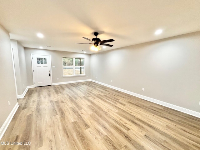 interior space with ceiling fan and light wood-type flooring