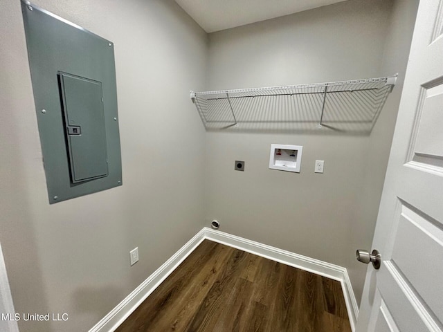 washroom with hardwood / wood-style floors, electric dryer hookup, washer hookup, and electric panel