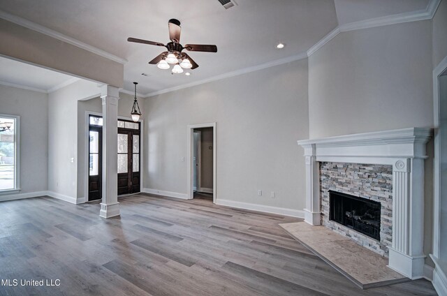 508 Jasmine Ct, Brandon, MS 39047 - unfurnished living room with a ceiling fan, baseboards, a fireplace, and wood finished floors