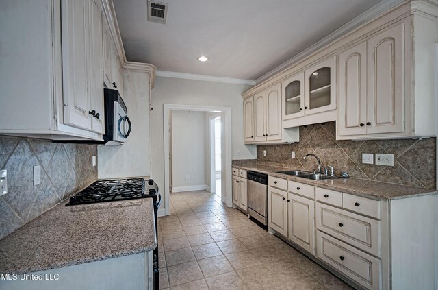 508 Jasmine Ct, Brandon, MS 39047 - kitchen with baseboards, visible vents, a sink, crown molding, and stainless steel appliances