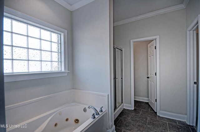 508 Jasmine Ct, Brandon, MS 39047 - bathroom featuring a tub with jets, stone finish floor, baseboards, a shower stall, and ornamental molding