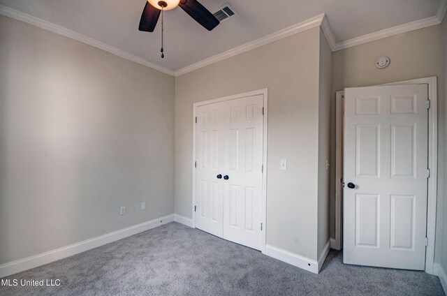 508 Jasmine Ct, Brandon, MS 39047 - unfurnished bedroom with crown molding, carpet, baseboards, and visible vents
