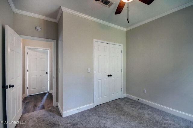 508 Jasmine Ct, Brandon, MS 39047 - unfurnished bedroom with crown molding, carpet flooring, baseboards, and visible vents