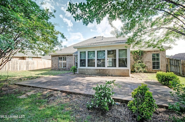 508 Jasmine Ct, Brandon, MS 39047 - back of property featuring a yard, a patio, brick siding, and a fenced backyard