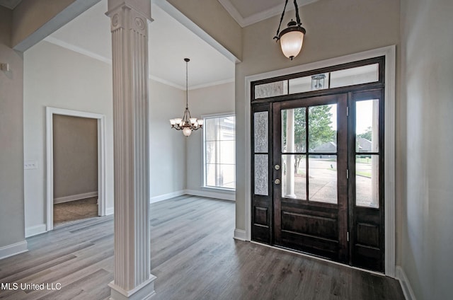 508 Jasmine Ct, Brandon, MS 39047 - entryway featuring ornamental molding, wood finished floors, baseboards, and decorative columns
