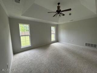 134 Shadow Ln, Batesville, MS 38606 - carpeted empty room featuring a raised ceiling, baseboards, and ceiling fan