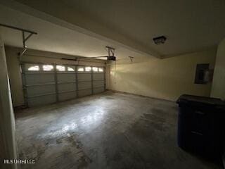 134 Shadow Ln, Batesville, MS 38606 - garage with electric panel and a garage door opener